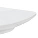 A close up of a CAC Super White Clinton Triangular Saucer.