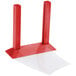 A red wooden Menu Solutions table tent with a white sheet on top.