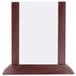 A mahogany wood table tent with white paper in it.