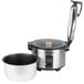 A Proctor Silex stainless steel rice cooker with a lid.