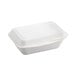 An EcoChoice white compostable bagasse take-out container with a lid.