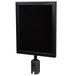 A black Aarco stanchion sign frame with a white sign displayed in it.