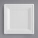 A white square plate on a gray background.