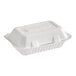 A white, rectangular, compostable plant fiber take-out container with one compartment and a hinged lid.