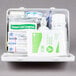 A Medique vehicle first aid kit in a white container with black text.