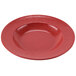 A close-up of a textured red melamine bowl.