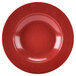 A close up of a textured red melamine bowl.
