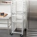 A Lakeside stainless steel sheet pan rack with angle ledges.