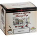 A box of 12 Caffe De Aroma green tea single serve cups with a picture of a city and a cup on a counter.