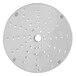 A circular metal Vollrath shredding plate with holes.