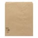 A brown merchandise bag with black text.