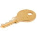 A gold Bobrick cabinet door key.