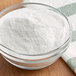 A bowl of Regal All-Natural Pectin, a white powder.