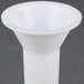 A white plastic Avantco sausage stuffer tube funnel.