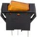 A black rectangular switch for Paragon popcorn poppers with a yellow light.
