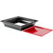 A black square object with a red edge.