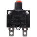 A black electrical switch with a red button.