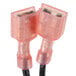A pair of pink cables with black connectors on a Paragon gear motor.