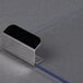 A metal corner piece for a Paragon 1911 popcorn popper.