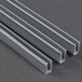 The front glass panel for a Paragon 1911 Popcorn Popper with metal trim.
