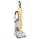 A ProTeam ProGen upright vacuum cleaner with a yellow cord and purple accents.