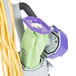 A ProTeam vacuum cleaner with a green bag inside.