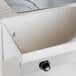 An Advance Tabco electric steam table with an undershelf.