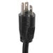 A black power cord with two plugs on it for an Advance Tabco electric hot food table.