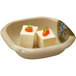 Two Japanese traditional white dishes with red caviar on top.