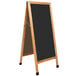 a black board with a wooden frame