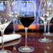 a group of wine glasses on a table