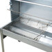 A stainless steel Optimal Automatics grill grate with a rack.