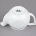 A white Tuxton teapot with a lid and handle.