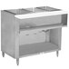 An Advance Tabco stainless steel hot food table with a shelf.