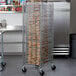 A Metro RE1 sheet pan rack with bread on it.