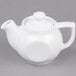 A Tuxton white china teapot with a lid.