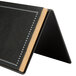 A black card holder with a white border for writing.