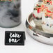 A Cal-Mil chalkboard tabletop tent with "yogurt and fruit" written on it.
