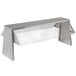 A stainless steel Advance Tabco buffet shelf with a clear sneeze guard over food on a counter.