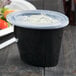 a black container with a clear lid