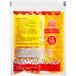 A white and red bag of Carnival King All-In-One Popcorn Kit with text.