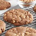 A REESE'S peanut butter cookie on a cooling rack.