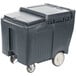 a black plastic container with wheels