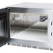 A close-up of a Solwave ceramic cavity plate in a commercial microwave.
