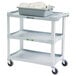 A gray Lakeside utility cart with a tray on top.