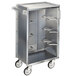 A silver Lakeside metal bussing cart with black wheels.