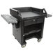 A black Cambro Versa cart with two shelves and casters.