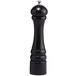 A black pepper mill with a silver top.