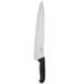 A Victorinox chef knife with a black handle.