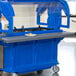 A blue tray rail on a Cambro food buffet cart.